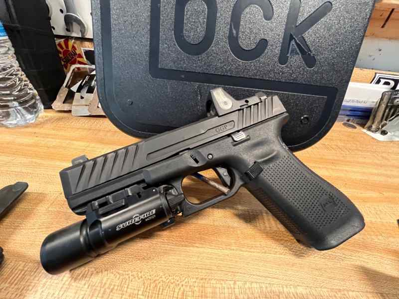 Glock G17 Gen5 w/ rmr and Surefire x300